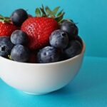 Strawberries and blueberries in a bowl